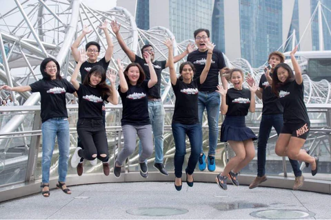 the noteway team celebrating with printed tshirts